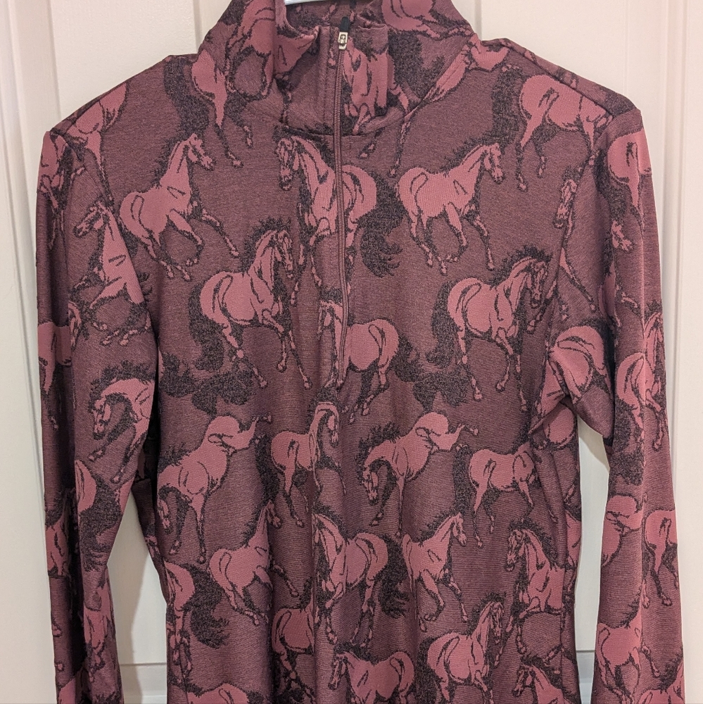 Women's zip up riding shirt.